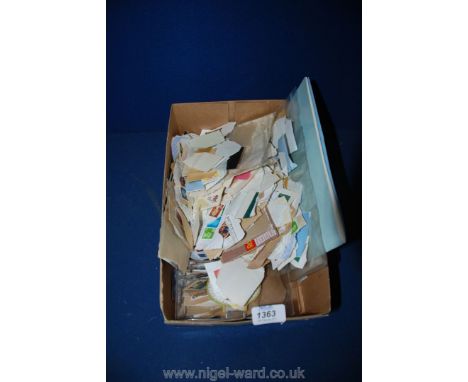 A quantity of Commemorative Postcards, loose stamps, First Day Covers and Heritage in stamps
