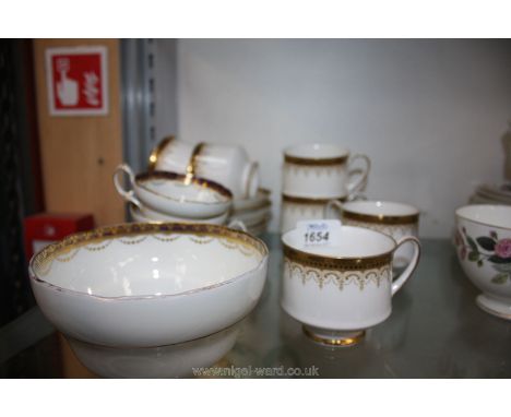 Six Paragon 'Athena' pattern cups and three cups, six saucers with a large sugar bowl by Hammersley