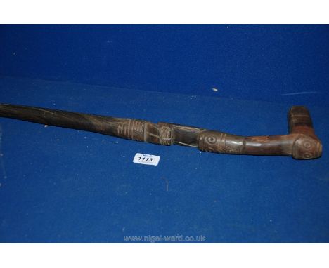 A hand carved hardwood Tribal Walking Stick