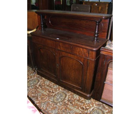 A good quality Victorian Mahogany Chiffonier, the top being an upper shelf with moulded edge, on frontal turned pedestal supp