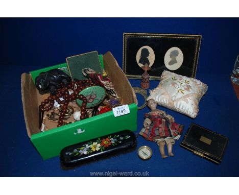 A box of assorted items embroidered pin cushion, brass frame, compact, doll, silhouette, cloisonné dish etc.