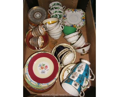 A quantity of vintage Bone China including tea cups, saucers and tea plates including Aynsley, Royal Staffordshire, Royal Gra
