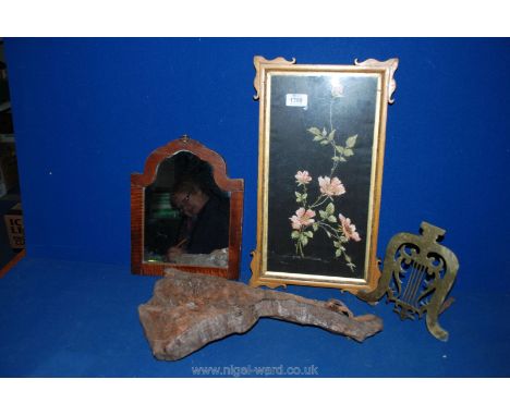 A small Georgian Mirror, a framed embroidered panel and a piece of old knotted wood  