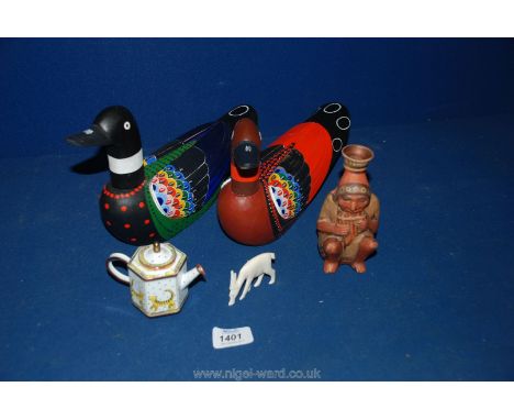 Two hand-made painted wooden Ducks, an Indian playing pipes, a small metal Teapot (no's 699 - 1993 hand-painted)