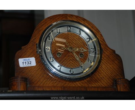An Oak cased Mantle Clock with two train movement, glass cracked