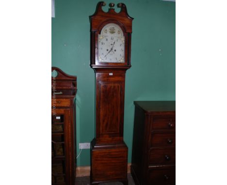 A Georgian Mahogany Longcase Clock having brass mounted swan pediment with central brass ball top to the hood, with fluted co
