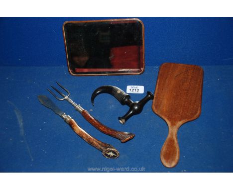 A horn knife, fork and boot pull and two small Mirrors.