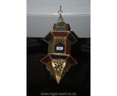 A North African hanging brass and glass Lamp