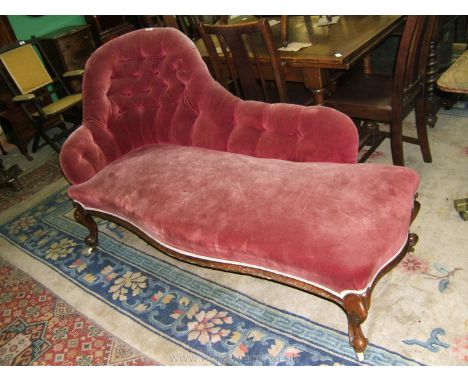 A good 19th c. Chaise Longue having corner back with button upholstery, serpentine seat with moulded show frame, standing on 