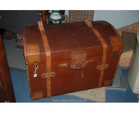 A Drew & Sons leather covered, dome topped Steamer Trunk.