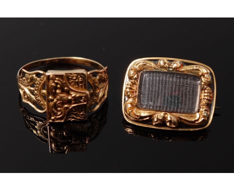 A 19th century yellow metal ring, the hinge top disguised as an envelope opening to reveal miniature portrait, together with 