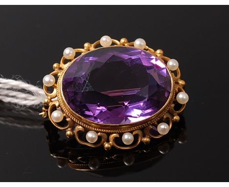A 14ct gold amethyst and seed pearl set brooch, 8.4g, 2.9cm