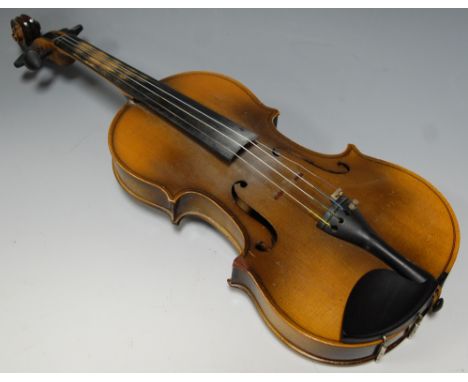 A mid 20th century continental violin bearing a label for Antonio Stradivarius with bow in fitted case