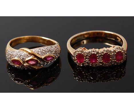 An 18ct gold ruby & diamond ring arranged as three marquise cut rubies within a surround of small pave set brilliants, 4g, si