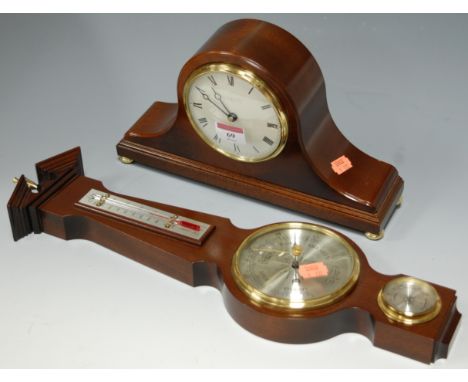A modern mahogany cased mantel clock the enamel dial with Roman numerals, signed Comitti of London, together with a small rep
