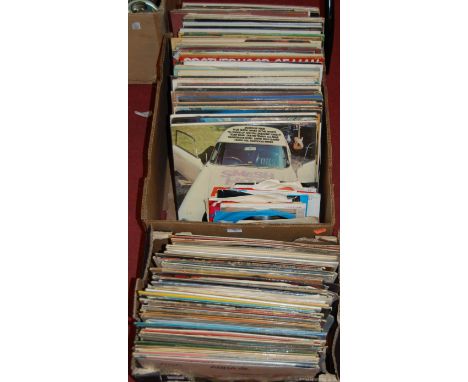 Two boxes of assorted 7" and long playing records to include Abba - The Album, Max Bygraves, Perry Como, etc