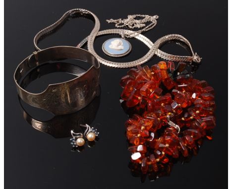 Assorted costume jewellery to include orange amber necklace, silver bangle, silver necklace, pair of ear studs etc