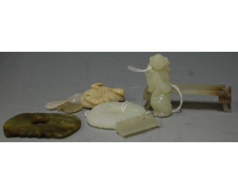 A small collection of assorted modern Chinese jadeite discs and carvings etc   Condition Report / Extra Information  The dark