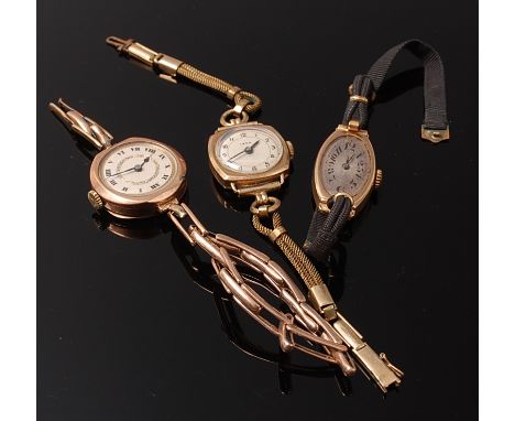 A ladies Art Deco 9ct gold cased watch having silvered oval dial, manual wind movement together with two other gold  cased la