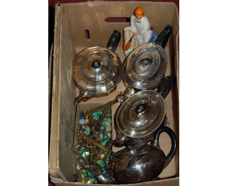 A box of miscellaneous items, to include; reproduction Staffordshire figure, silver plated part tea service, glass marbles et