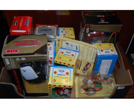 A collection of boxed Corgi Noddy in Toyland diecast vehicles; together with a Burago 1.18 scale Mini Cooper; a Burago 1.24 s