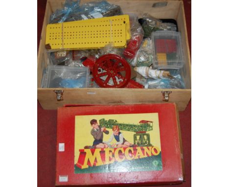 A large quantity of mixed 1950s and later Meccano, all in used condition, to include flat sections, straights, wheels, Meccan