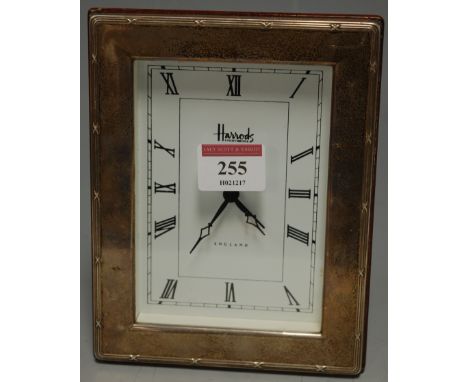 A modern silver mounted mantel clock for Harrod's, h.17cm