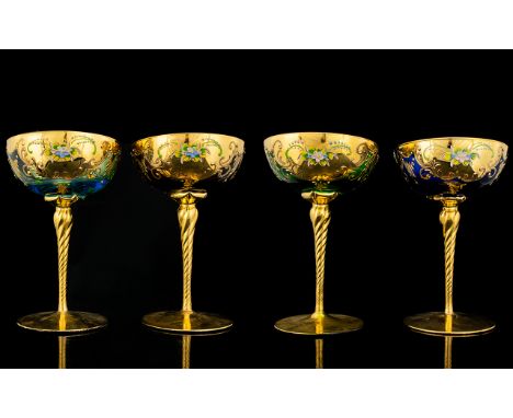 Four Mid Century Italian Gilt Glass Champagne Saucers All in very good condition, the bowls in mixed colours of cobalt, teal 