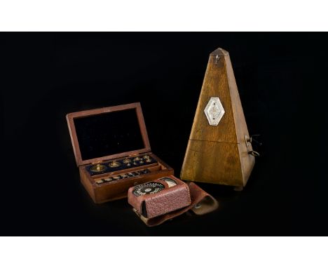 Maelzel Paquet French Vintage Metronome Of Traditional construct, white metal cartouche to front marked 'Maelzel Paquet, 1815
