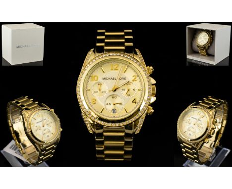 Michael Kors MKT 5166 Gold Tone Crystal Set Blair Chronograph Wrist Watch. Features Champagne Coloured Dial, Quality Japanese