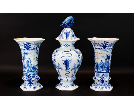 Antique 18th century Dutch Delft Garniture Set  Comprising a lidded, moulded centre vase with parrot finial to lid together w