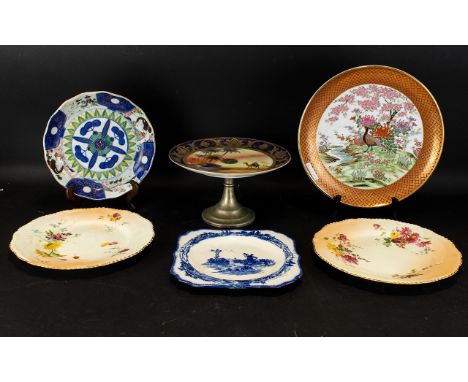 A Small Collection Of Pottery To include two Royal Worcester hand painted floral cabinet plates with gilt trim, each marked t