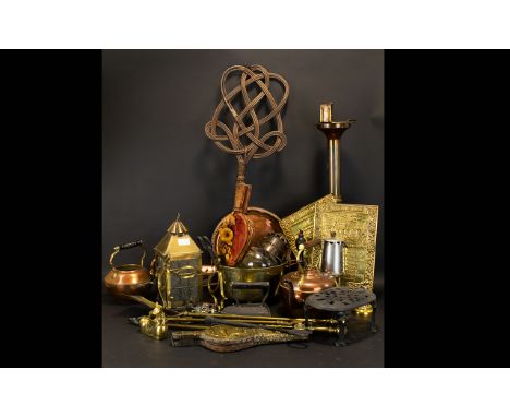 A Large Mixed Lot Of Metalware To include floor standing ashtray, hanging paraffin lamp, brass jam pan, copper wall charger c