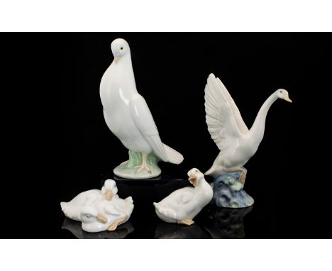 A Collection Of Nao Bird Figures To include standing dove, swan with outstretched wings, and two smaller figures in the form 