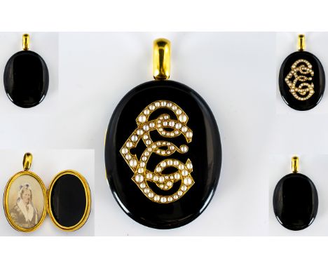 18ct Gold Seed Pearl And Black Enamel Mid Victorian Period Wonderful And Large Oval Form Double Mourning Locket An impressive