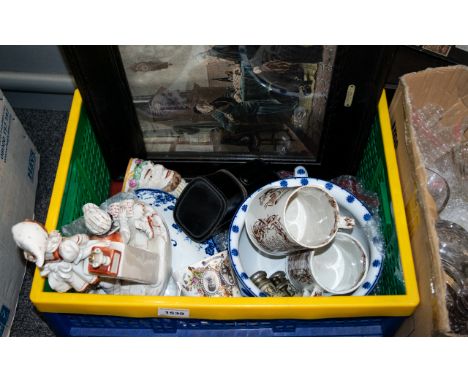 A Box Of Miscellaneous Pottery to include a framed print, chrome double hip flask, blue and white bowl, commemorative cups et