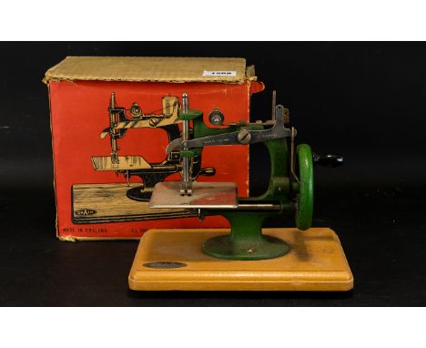 Vintage Grain Small Junior Hand Sewing Machine In original box  - slight damage to box indicative of age. Sewing machine in p