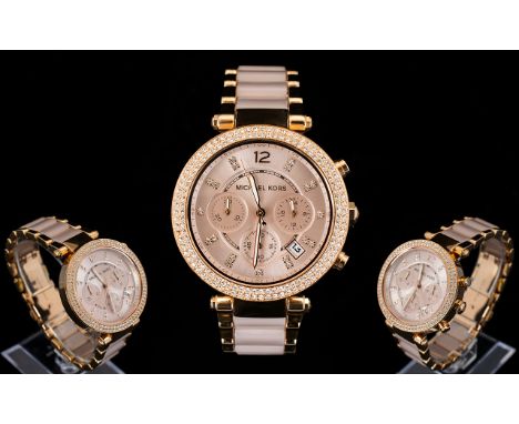 Michael Kors MK 5896 Ladies Signature Design Chronograph Wrist Watch. Features Pink Dial, Rose Gold Plated Bracelet, 3 Chrono
