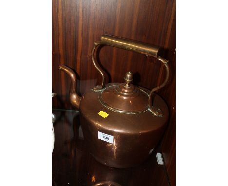 A LARGE VINTAGE COPPER KETTLE 