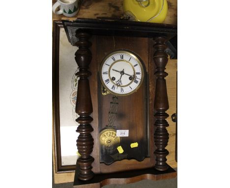 A VINTAGE MAHOGANY WALL CLOCK A/F, TOGETHER WITH AN EMBROIDERED OAK SERVING TRAY (2) 