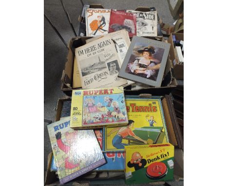 TWO TRAYS OF VINTAGE BOOKS AND MAGAZINES TOGETHER WITH A BOX OF VINTAGE BOARD GAMES ETC