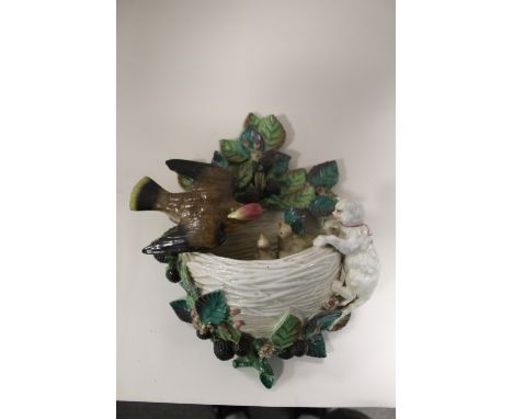 AN ANTIQUE CERAMIC WALL POCKET - RESTORED 