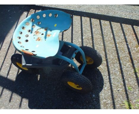 CHILDS SIT ON TROLLEY WITH TRACTOR STYLE SEAT 