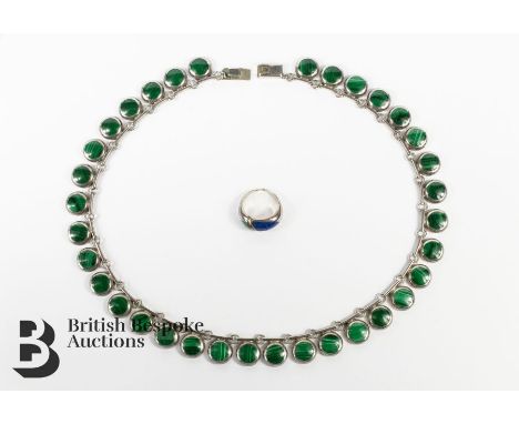 Mexican silver and malachite button necklace. The bar and link necklace having thirty four button-set malachite drops 12 mm e