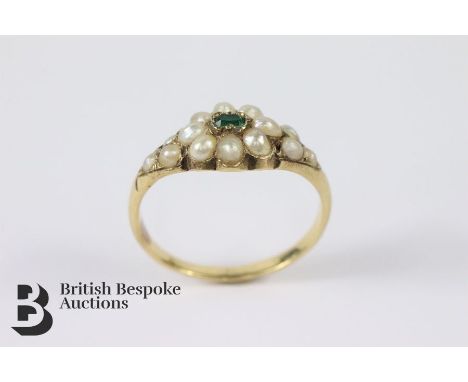 Victorian 18ct yellow gold and emerald ring. The ring set with a central rectangular emerald approx 2.5 x 1.5mm, surrounded b
