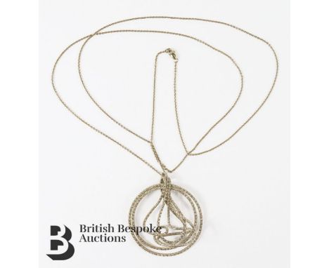 18ct yellow gold Italian spiral loop diamond pendant. The pendant set with approx 3cts of champagne diamonds, suspended from 