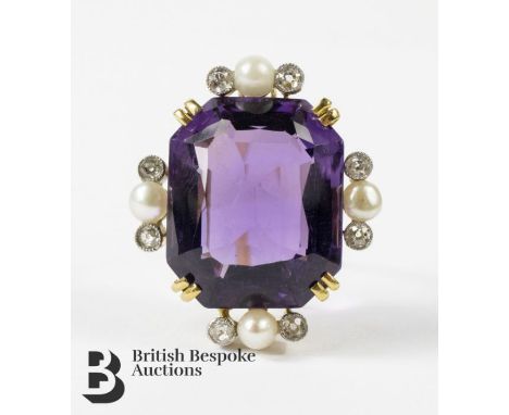 18ct gold (tested) amethyst, pearl and diamond brooch. The brooch set with an amethyst 20 x 16 mm, 4 x 4mm pearls and 48 pts 