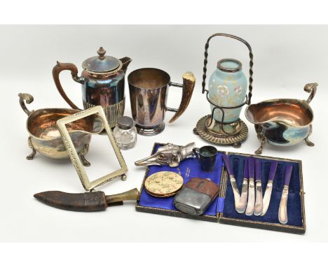 AN ASSORTMENT OF WHITE METAL WARE, to include two sauce jugs, a cased set of tea knives, a coffee pot, a 'Bonzer' measuring c