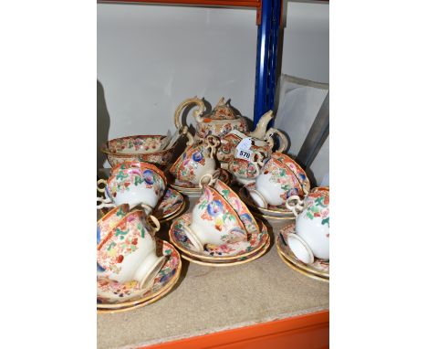 A TWENTY SEVEN PIECE NINETEENTH CENTURY TEA SERVICE most likely G. F. Bowers, circa 1850, comprising a teapot, milk jug, slop