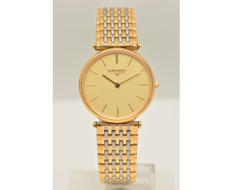 A GENTS 'LONGINES' WRISTWATCH, quartz movement, round gold tone dial, signed 'Longines', baton markers, gold plated case, app